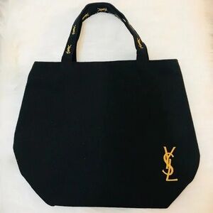 Yves Saint Laurent Black and Gold Perfume Bag